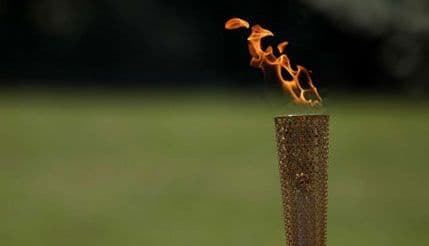 Olimpijska baklja zaronila u Bajkalsko jezero Olimpijska baklja zaronila u Bajkalsko jezero