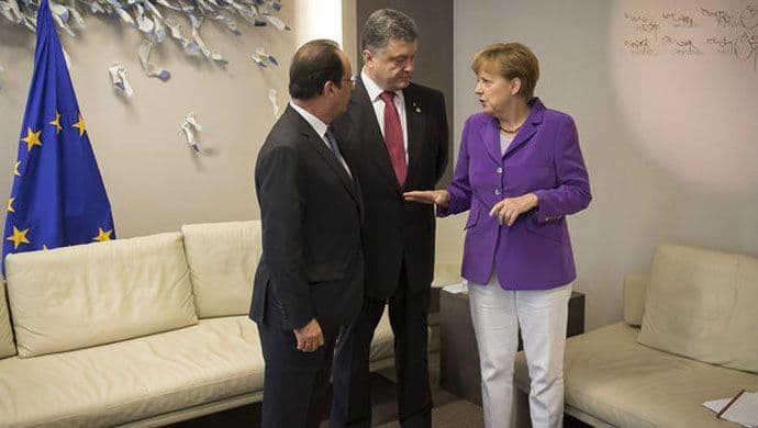 Oland, Merkelova i Porošenko razgovarali o Ukrajini Oland, Merkelova i Porošenko razgovarali o Ukrajini