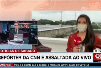 Opljačkao novinarku koja se javljala uživo (VIDEO) Opljačkao novinarku koja se javljala uživo (VIDEO)