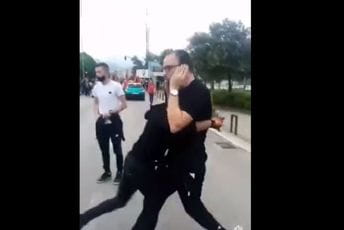 Policajac pocijepao crnogorsku kapu učesniku autokolone Policajac pocijepao crnogorsku kapu učesniku autokolone