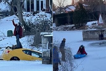 Popela se na vrh automobila koji tone kako bi napravila selfi Popela se na vrh automobila koji tone kako bi napravila selfi